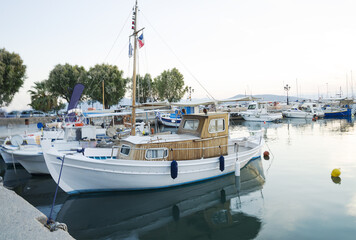 Fototapeta premium sea bay with boats on a summer evening