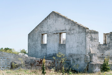 damaged ruined building, destroyed settlement after war