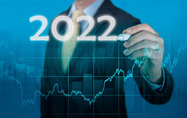 Growth success developments in 2022 concept. Businessman in suit forecast analysis plan profit...