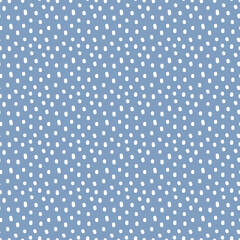 Vintage Polka Dot seamless pattern. White irregular spots, scattered various shape specks on blue background. Abstract vector texture for nursery print design, fashion textile, fabric, scrapbooking