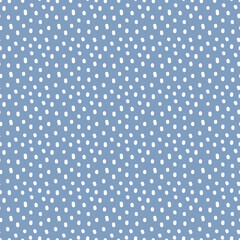 Vintage Polka Dot seamless pattern. White irregular spots, scattered various shape specks on blue background. Abstract vector texture for nursery print design, fashion textile, fabric, scrapbooking