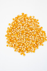 Pile of Popcorn kernels isolated on white background
