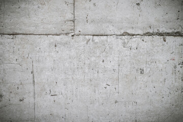 The white concrete stone. concrete plastered stucco wall painted. white grunge cement or concrete painted wall texture. The cement wall background abstract gray concrete texture for interior design.