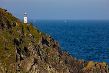 Fototapeta na wymiar Spy House Point Lighthouse in Polperro, Cornwall, UK