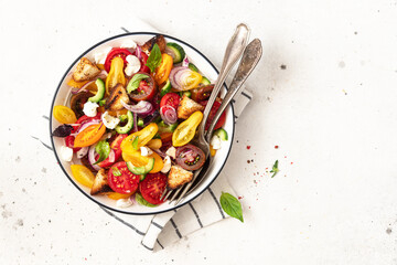 Vegetable salad. Panzanella traditional food of Italy with colorful tomatoes and bread	