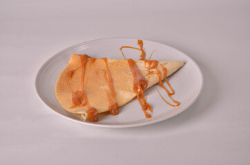 Crepe whit cajeta background white