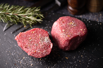 tenderloin raw steak seasoned with salt and pepper