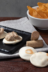 Pita bread and nacho with sauce.