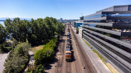 Fototapeta na wymiar Train Preparing to Depart the Port in Seattle Aerial Photo