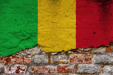 Graphic Concept with a Flag of Mali painted on a damaged brick wall.