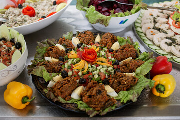 photo of a plate with a warm eggplant salad on the buffet, Moroccan cuisine