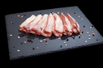 fresh raw meat presentation on granite