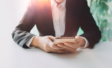 Business people using tablets And using his finger to touch the screen With a business graph showing up in a virtual screen.New startup ideas and business growth concept.