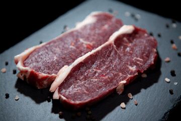 fresh raw meat presentation on granite