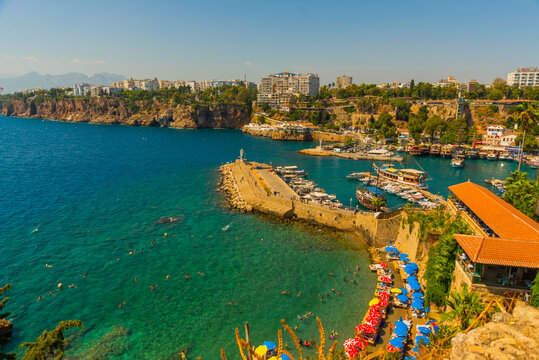 ANTALYA, TURKEY: Mermerli beach with clear blue water in old town Kaleici district in popular seaside resort Antalya.