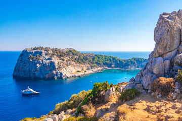 Anthony Quinn Bay with turquoise clear water Faliraki Rhodes Greece. - obrazy, fototapety, plakaty