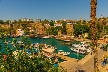 ANTALYA, TURKEY: The old harbor in Antalya and the port with ships and boats on a sunny summer day.