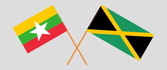 Crossed flags of Myanmar and Jamaica. Official colors. Correct proportion