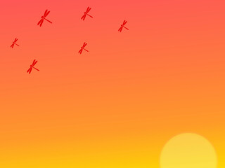 赤とんぼとグラデーション夕焼けの背景 © designewb