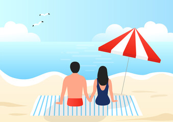 Fototapeta premium Man and woman sunbathing on the beach.