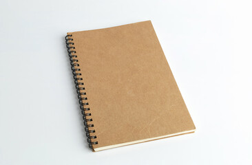 blank cover spiral notebook on white background for mockup blank template