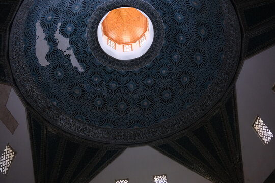 inside the Karatay Madrasa in Konya. Magnificent dome and light coming from top of windows and some of tiles are missing 