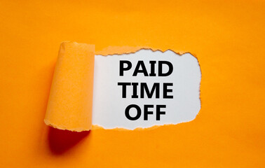 Paid time off symbol. Words 'Paid time off' appearing behind torn orange paper. Beautiful orange...