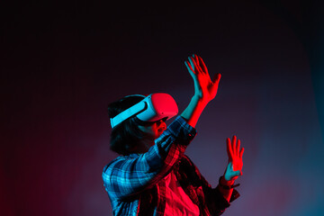 Woman vr glasses, using virtual reality headset, trying to touch something