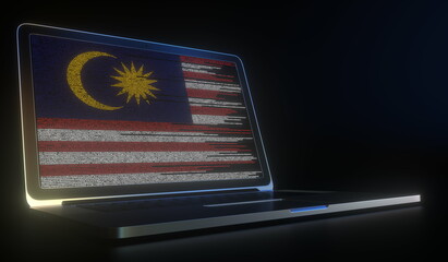 Flag of Malaysia made with computer code on the laptop screen. Hacking or cybersecurity related 3d rendering