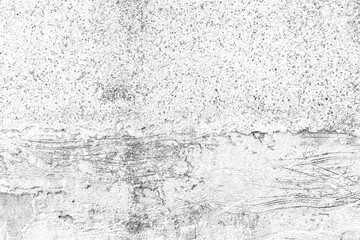 Old cement wall painted white, peeling paint texture and background