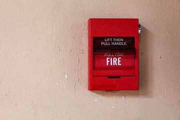 Fire alarm switch on the cement wall