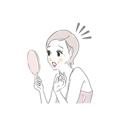 鏡でお肌をチェックする女性