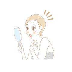 鏡でお肌をチェックする女性