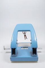 a Strong figure man doing pull up with hole puncher