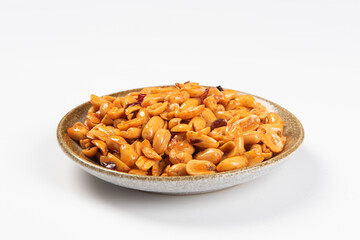 delicious snack fried spicy peanuts on white background
