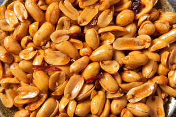 close up of  snack fried spicy peanuts background