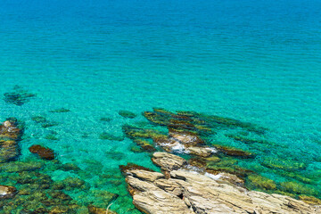 Crystal clear water with a view of the rocky surface