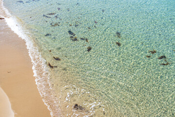 Sparkling clear water and sandy beaches.