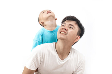 A father and child making faces