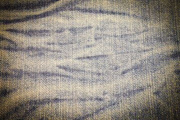 Vintage texture of blue jeans.