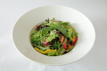 season green vegetables with salad dressing sauce appetiser in white background Christmas festival menu