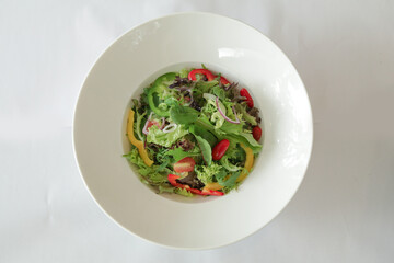 season green vegetables with salad dressing sauce appetiser in white background Christmas festival menu