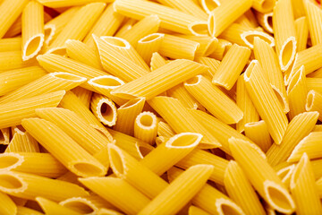 italian penne pasta fluted close - up background backdrop