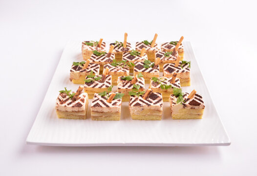 Mini Coffee Tiramisu Pastry Cream Cake Dessert On Party Tray In White Background For Christmas Festival Menu