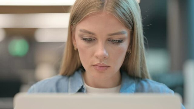Close Up of Woman Working on Laptop