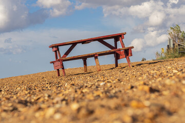 A picnic bench and table on Heacham South Beach, Norfolk, England, UK