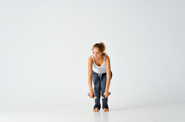 Fototapeta na wymiar sportive woman dumbbell muscles exercise fitness motivation