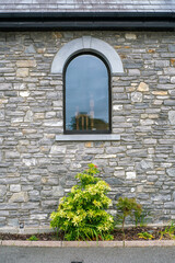 Arch window on the stone wall