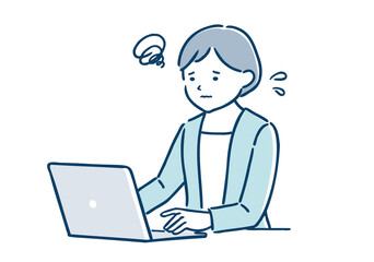 PCの操作で悩むビジネスウーマン