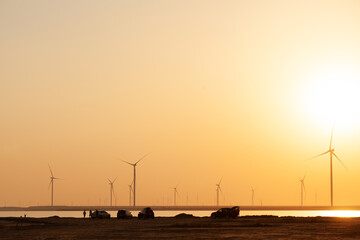 Modern electric mills and the sea.